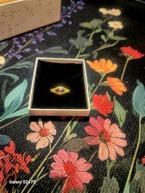 Gold Ring with Ruby-Red Center Stone